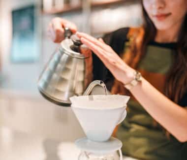 Pouring water over coffee grounds. best pourover coffee makers.